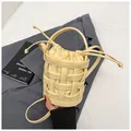 Borsa a secchiello intrecciata crema minimalista con coulisse e tracolla moda - Giallo senza Ciondolo