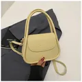 Elegant cream-colored small square bag with lychee texture and top handle strap - Yellow