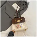 Petit sac à dos vintage bicolore marron et blanc avec fenêtre PVC et breloques peluches - Blanc Marron Avec Pendentif