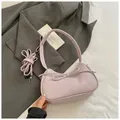 Bolso de mano lavanda con lazo en cuero granulado lichi y correa de hombro extraíble - Morado