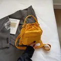 Fashionable bright yellow nylon drawstring crossbody bucket bag with zipper pocket - No Pendant / Yellow