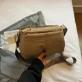 Minimalist beige nylon crossbody bag with multiple zip pockets and wide strap - Khaki