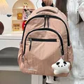 Roze waterdichte nylon rugzak voor studenten met meerdere vakken en een sterrenhanger - Met Hanger / Roze