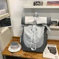 Grauer Rolltop-Rucksack mit passendem Sonnenhut, wasserdichte Outdoor-Tasche für Paare - Rucksack / Grau