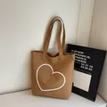 Brown canvas heart embroidery tote bag with gold heart detail and long shoulder straps - Brown