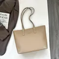 Chic khaki leather tote bag with pebble grain texture and reinforced base corners - Khaki