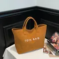 Brown faux suede large tote bag with white TOTE BAG print for daily commuting - Brown