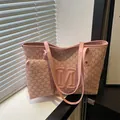 Pink tote bag and coin purse set with all-over M-letter prints and large embossed logo - Pink