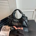 Fashionable black tote bag with bow details and adjustable shoulder strap for women - Black With Pendant