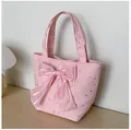 Detailed shot of pink canvas tote bag with large satin bow and silver star sequins - Pink with Pendant