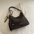 Deep brown matte tote bag with golden branding, tassel detail, and a cute bear keychain - With Pendant / Brown