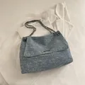 Blue tweed chain tote bag with metallic bar detail and textured woven fabric finish - Light Blue