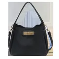 Damen-Beuteltasche mit schwarzem Litschimuster, goldenem Drehschloss und Tragegurt - Schwarz
