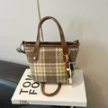 Brown plaid tweed tote bag with leather straps and decorative wooden beads - Khaki Plaid With Charm