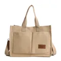 Beige canvas tote bag with dual front pockets and adjustable shoulder strap for women - Khaki