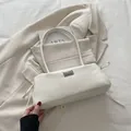 Chic cream-white baguette shoulder bag with side drawstring details and twin handles - White