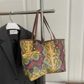 Colorful snakeskin pattern tote bag with matching zipper pouch and brown straps - Yellow Snake Pattern