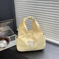 Pale yellow crossbody bag with silver star prints and Good Luck puppy embroidery - Yellow