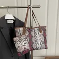 Chic pink snakeskin pattern tote bag with matching zippered pouch and brown straps - Purple Snake Pattern