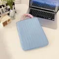 Light blue quilted laptop sleeve with pink pleated handles and minimalist vertical stripes - Vertical Blue