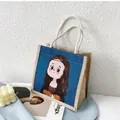 Artistic jute handbag featuring cartoon Mona Lisa illustration and cotton rope handles - Mona Lisa