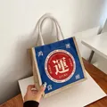Borsa tote in lino blu navy con cerchio rosso e design con scritta Lucky - Buona Fortuna (Buona Sorte)