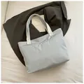 Light blue tote bag with frilled handles and I am creamy embroidery detail - Blue