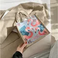 Linen tote bag with pink flamingo and blue tropical leaf prints on soft textile - Pink Flamingo