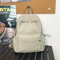 Sac à dos à carreaux beige en tissu ripstop résistant avec poches latérales à cordon - Poche zippée