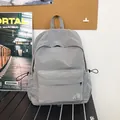 Sac à dos gris minimaliste à motif écossais avec poches latérales à cordon - Gris