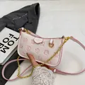 Chic pink and white underarm bag with cute 3D cartoon embossing and gold chain strap - Pink