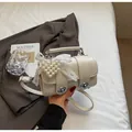 Borsa a cilindro color crema con fiocco in pizzo e ciondolo a cuore con perla a mano - Con Ornamento / Bianco Sporco