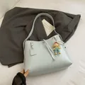 Light blue minimalist faux leather tote bag with elegant pearl and doll charm - Blue with Pendant