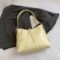 Minimalist cream yellow soft faux leather tote bag with stylish fringe detail - Yellow without Pendant