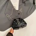 Black quilted drawstring bucket bag with sparkling rhinestones and pearl details - Black (No Handle)