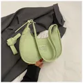 Chic light green crescent hobo bag in lychee pattern leather with metal logo - Green