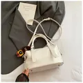 Creamy white crocodile pattern bowling bag with cute bear charm and adjustable strap - White With Pendant