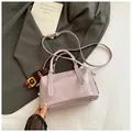 Elegant light purple faux crocodile bowling bag with doll charm and adjustable strap - Purple with Pendant