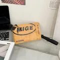 Retro yellow crossbody bag with MIGE lettering and black nylon strap in casual style - Orange
