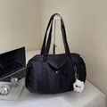 Large black waterproof nylon tote bag with a white plush monster charm for commuting - Black without Pendant