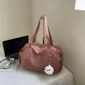 Lightweight grey-pink nylon tote bag with cartoon charm for travel and commute - Bean Paste Pink Without Charm