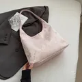 Pink underarm bag with gold butterfly pattern on floral jacquard fabric - Pink Bamboo Leaf