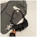 Minimalist black patent leather dumpling crossbody bag with cute star and dog charms - Star Pendant Included / Black