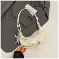 Chic cream-colored glossy pleated hobo bag with silver starfish charm detail - Star Pendant Included / White