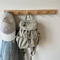 Light khaki drawstring backpack in nylon with multi-pockets and functional aesthetic - Khaki