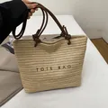 Grande borsa tote in paglia con manici marroni e ricamo per le vacanze estive - Marrone