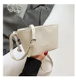 Minimalistische weiße Bucket Bag mit Litschimuster und verstellbarem Schultergurt - Weiß