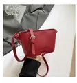 Red lychee texture leather bucket bag with silver buckle strap and FASHION logo - Red