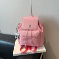 Pink canvas backpack with silver star patterns and a metallic star charm accessory - With Star Pendant / Pink