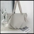 Grande borsa tote in tela crema con manico a nodo e decorazione a fiocco - Bianco Sporco